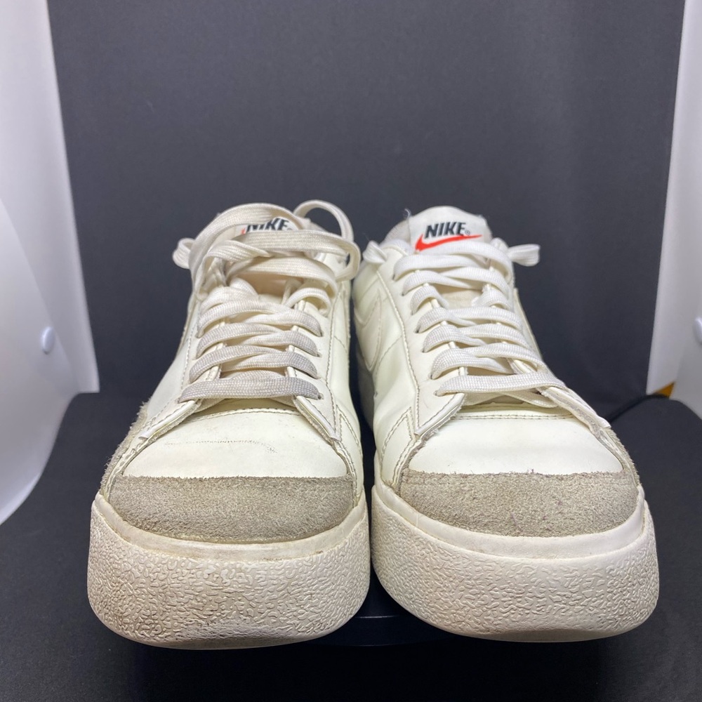 Nike Cream Sneakers with Red Accents